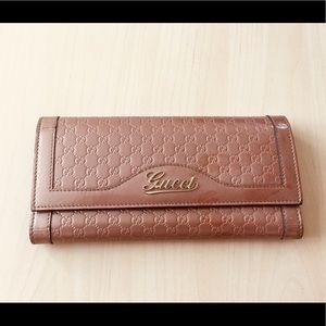 Gucci leather warm pink wallet
